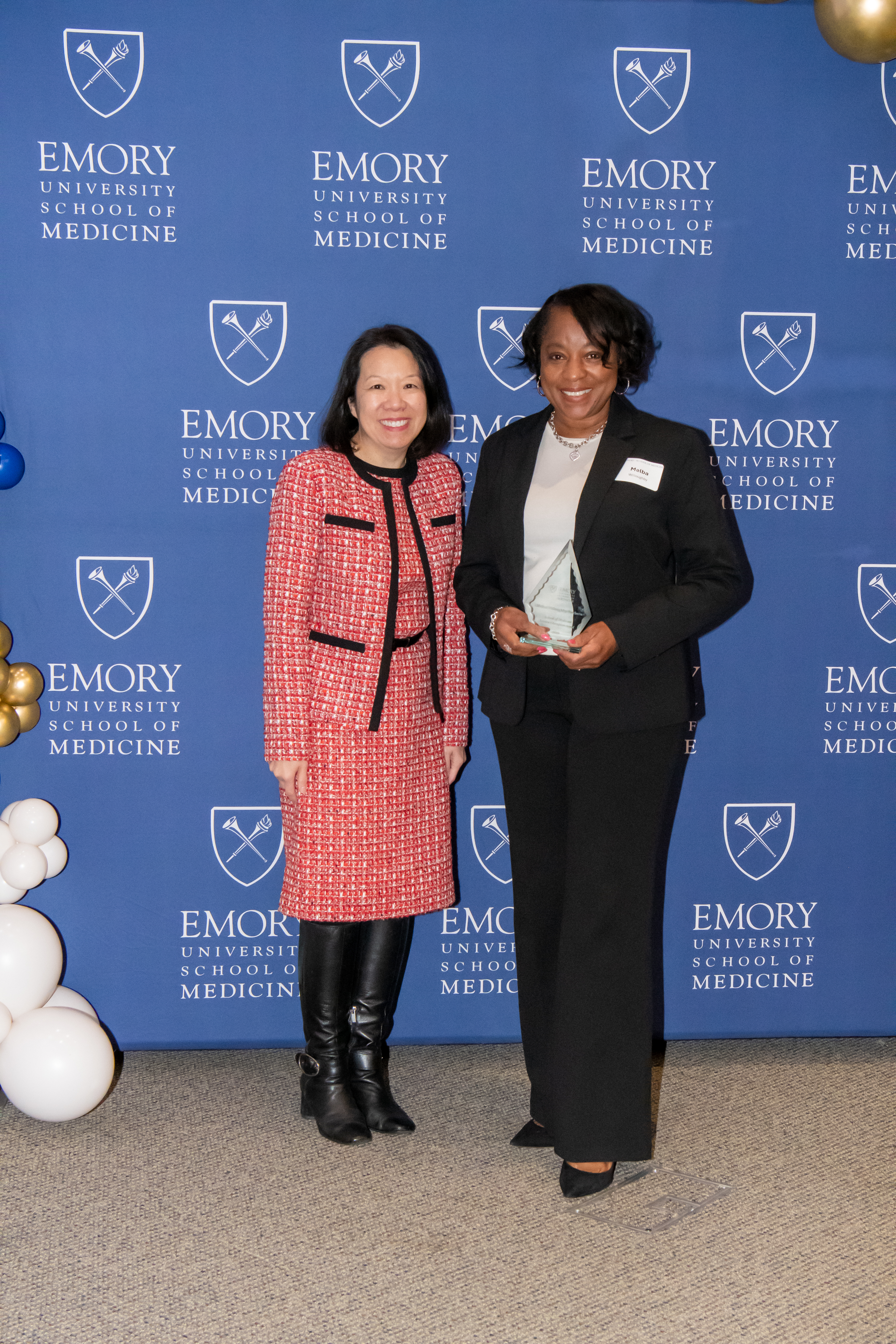 Melba Willoughby-Newbern accepting her award with Dean Wong.