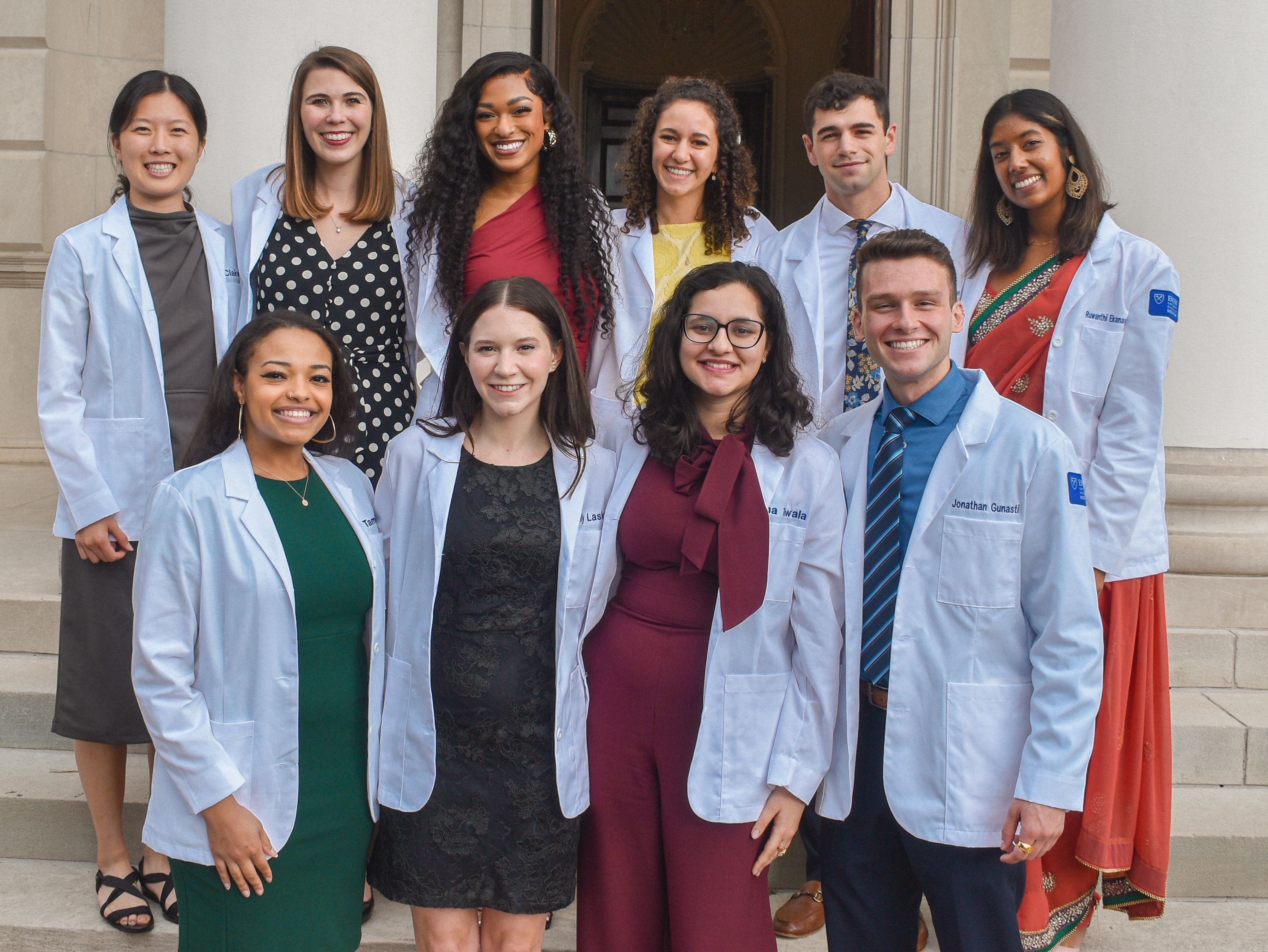 Group of MD PhD students in white coats