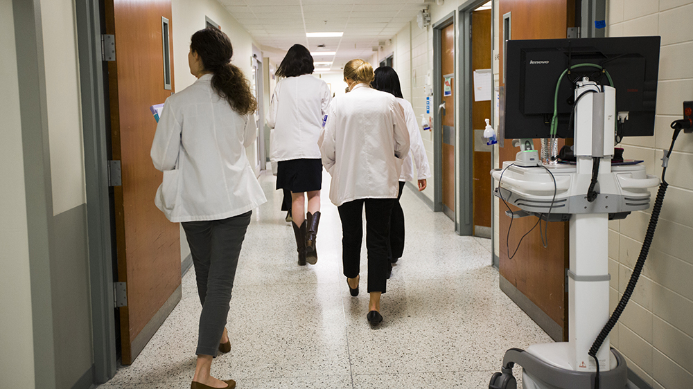 Staff walking in Emory Hospital
