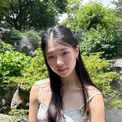 headshot of woman outside