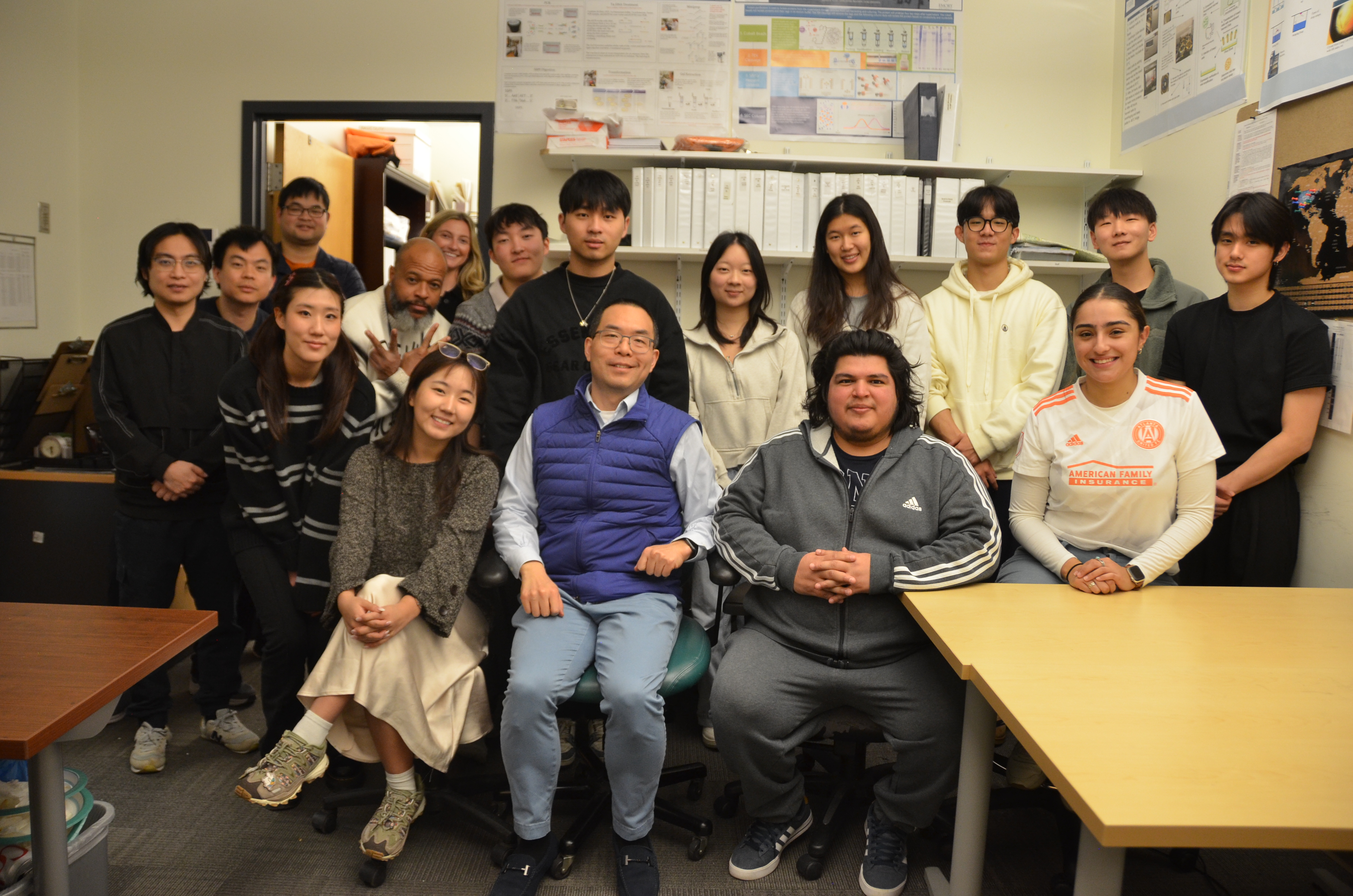 group photo of several people in office