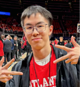 headshot of man on sports court
