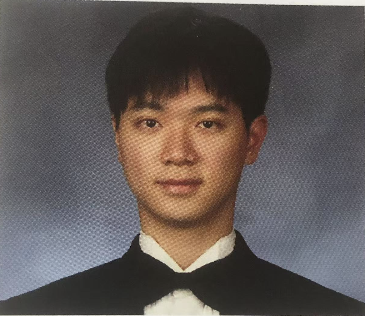 headshot of man in tuxedo