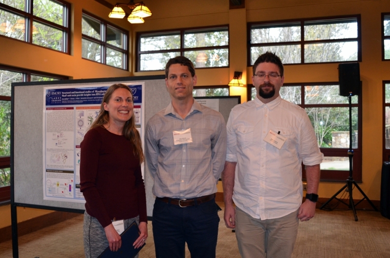 Dr. Eric Ortlund (center) presents Suzanne Mays (L) and Dr. Mike Tuntland (R) with Poster Awards at the 2016 SER-CAT Symposium