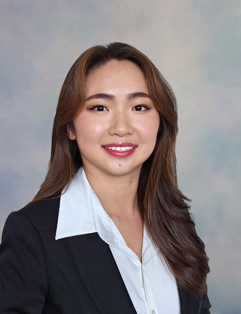 upper body image of woman in black suit