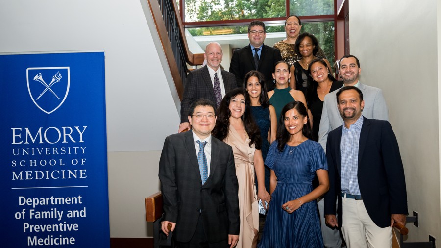 Emory family medicine faculty standing on  staircase