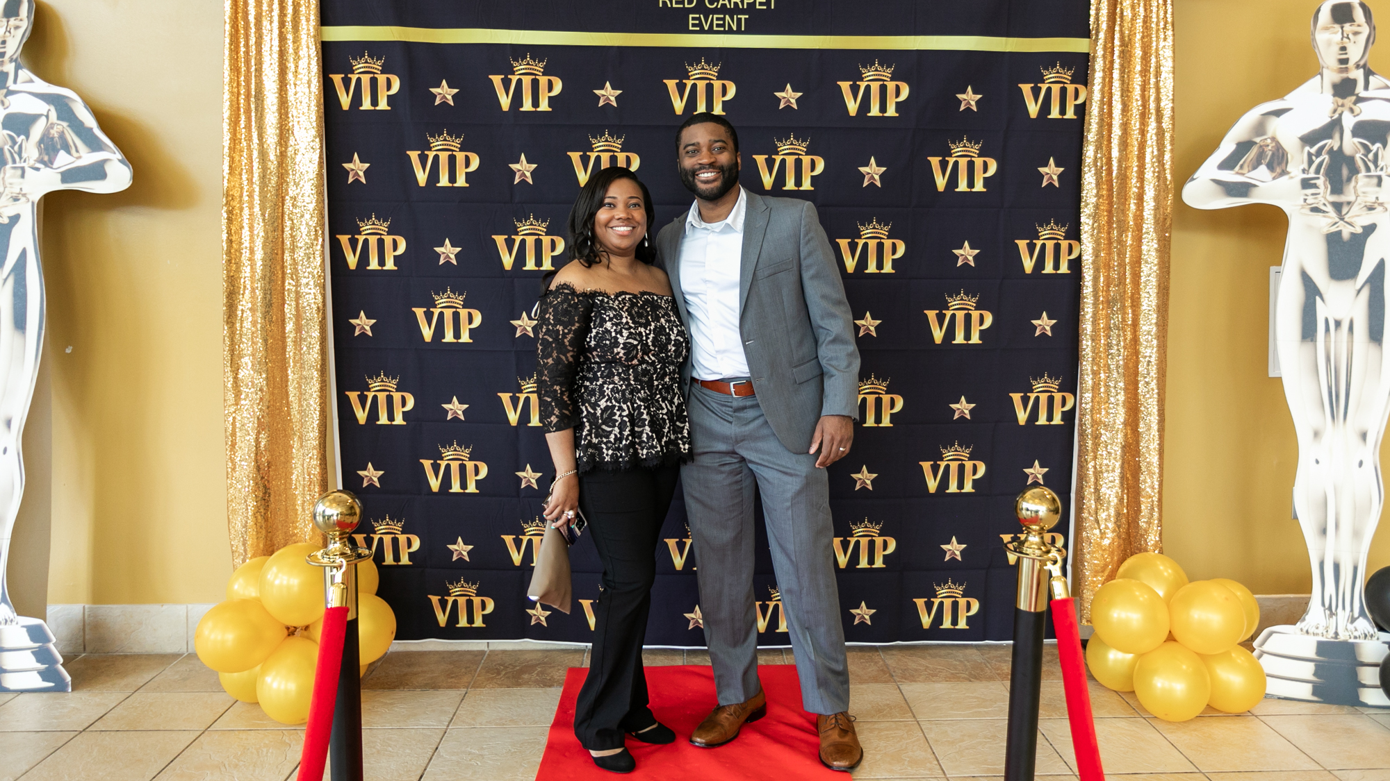 Dr. Annie Rouza and Dr. Eric Johnson on a red carpet