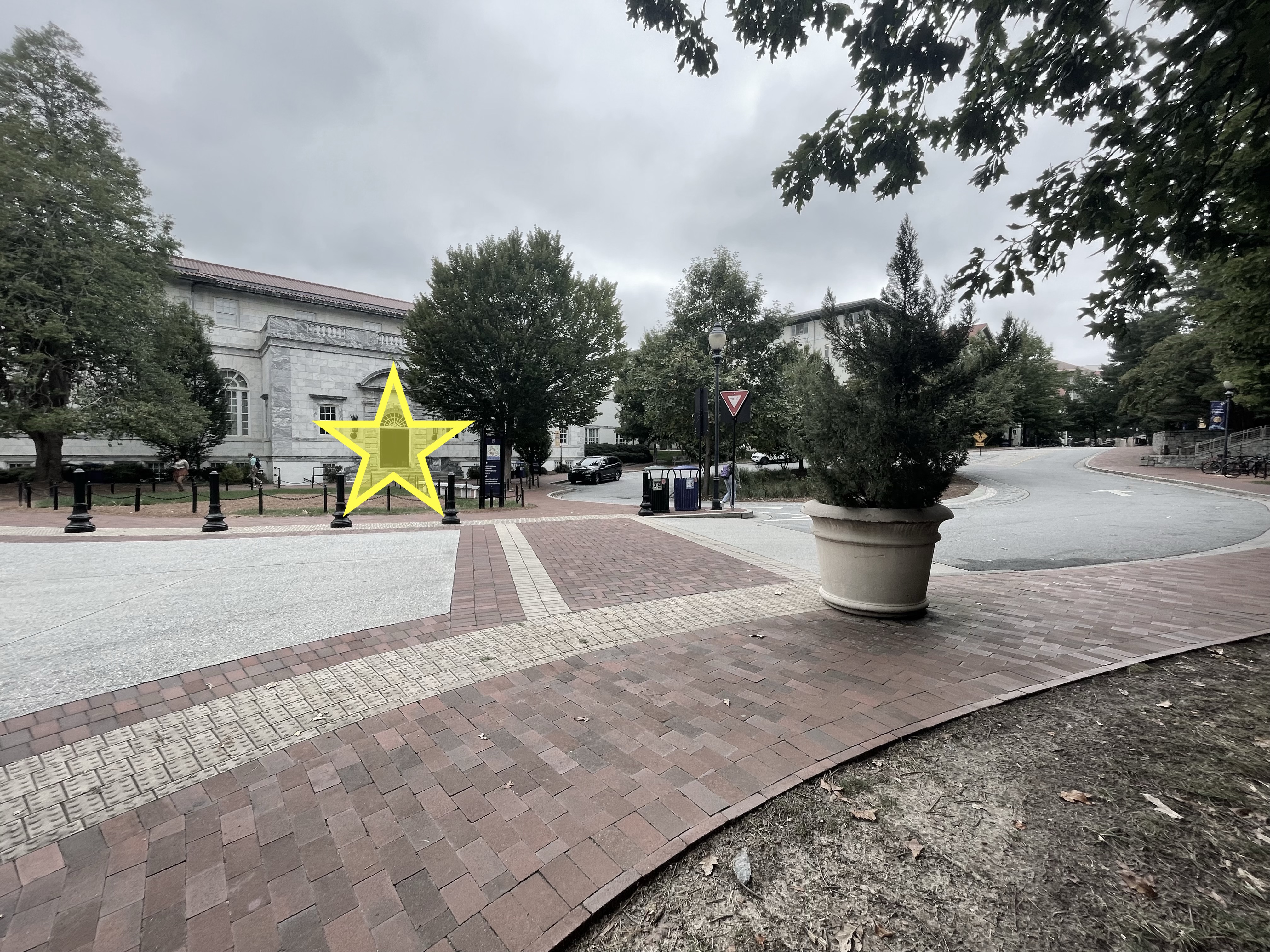 Picture of a building entrance with a red star.