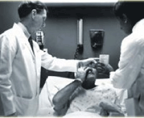 Dr. Aaberg attending a patient