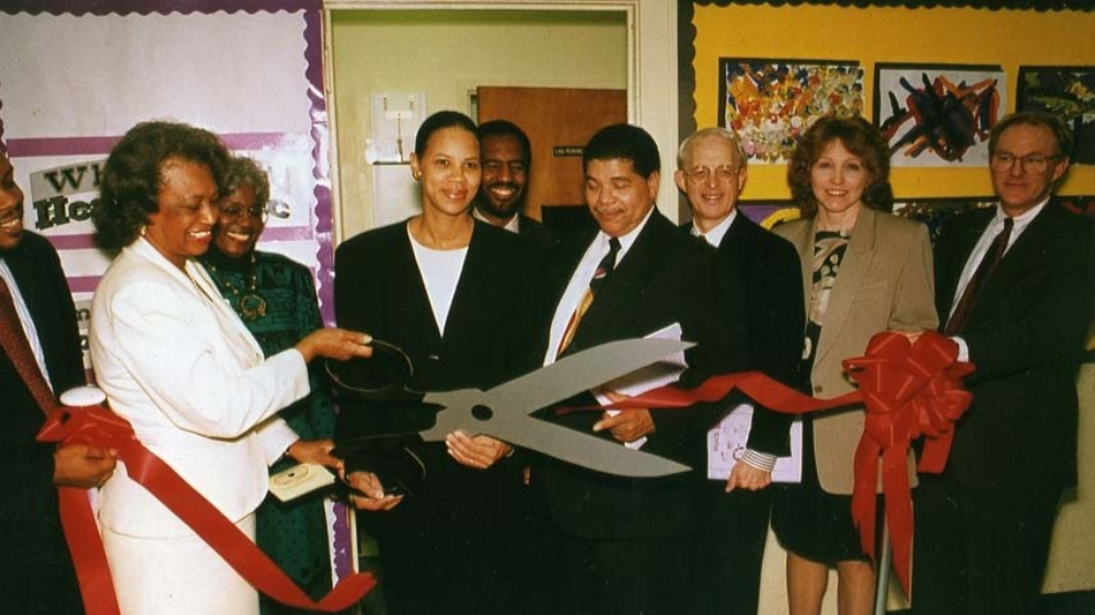 A photo of Veda Johnson and others at the Whitefoord Ribbon Cutting Ceremony.