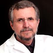 man in lab coat, Dr. Iuvone