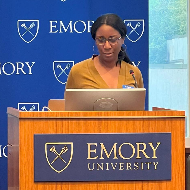 Courtney Law at podium at Emory 3D Symposium 2023