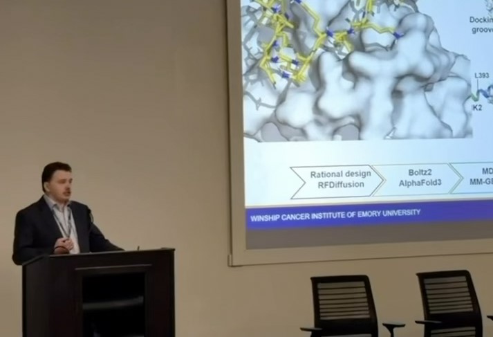 man standing at podium