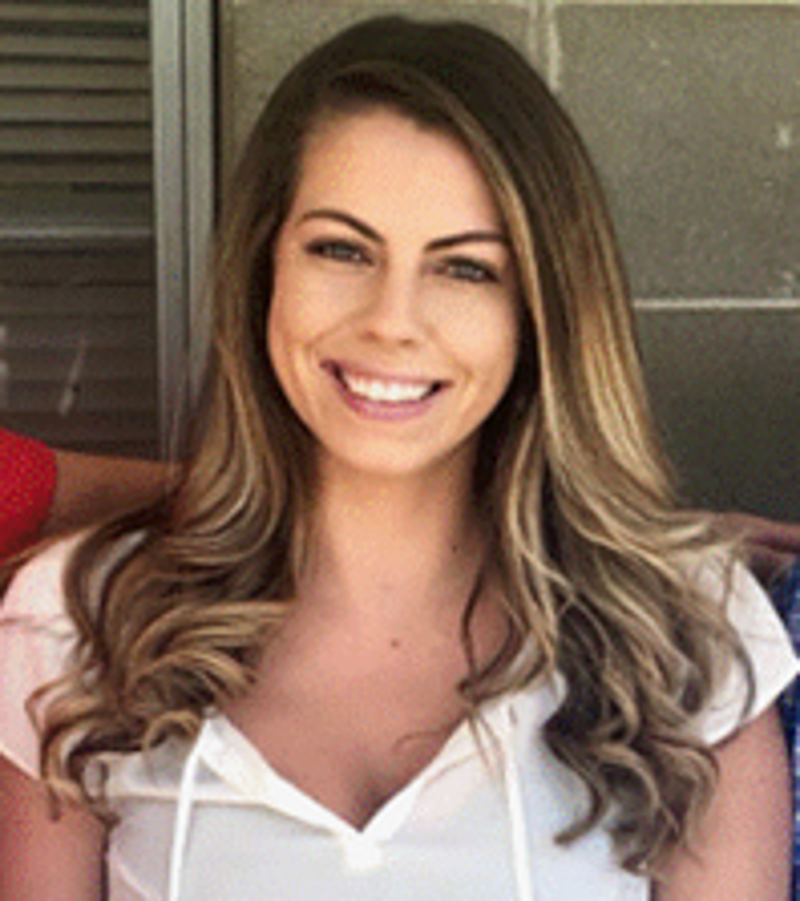 smiling technologist