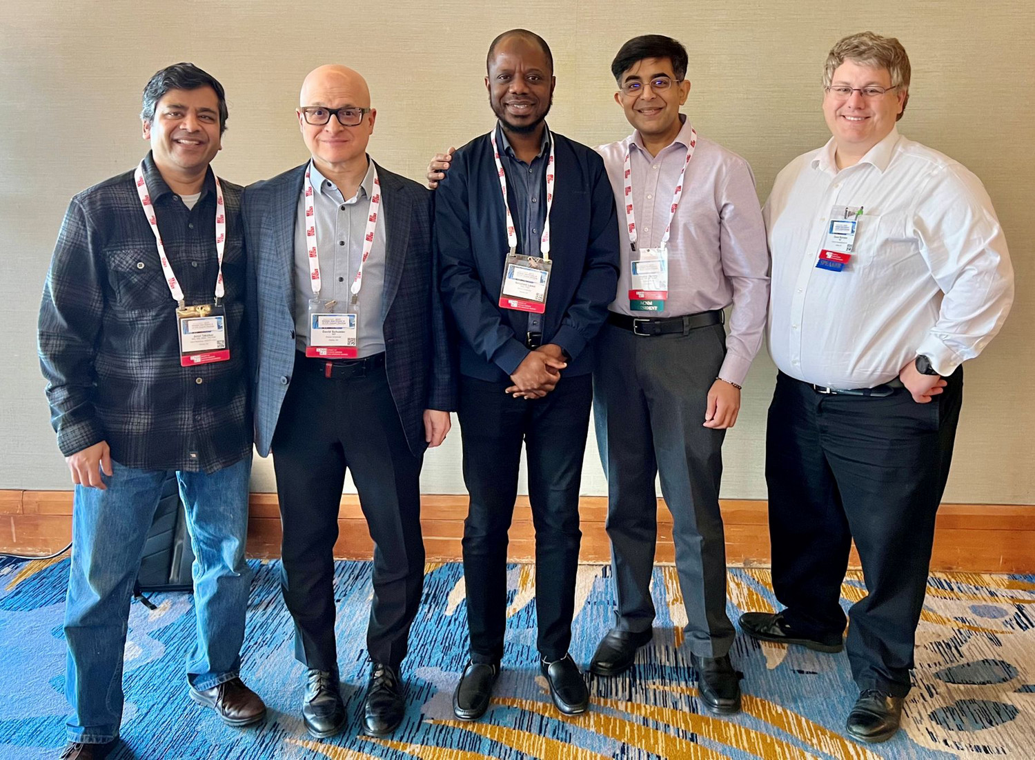 smiling nuclear medicine physicians at conference