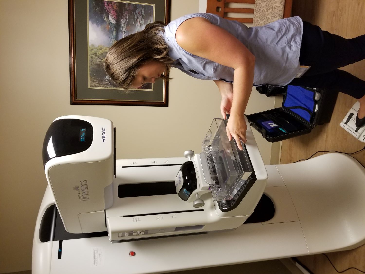 person testing a mammography machine