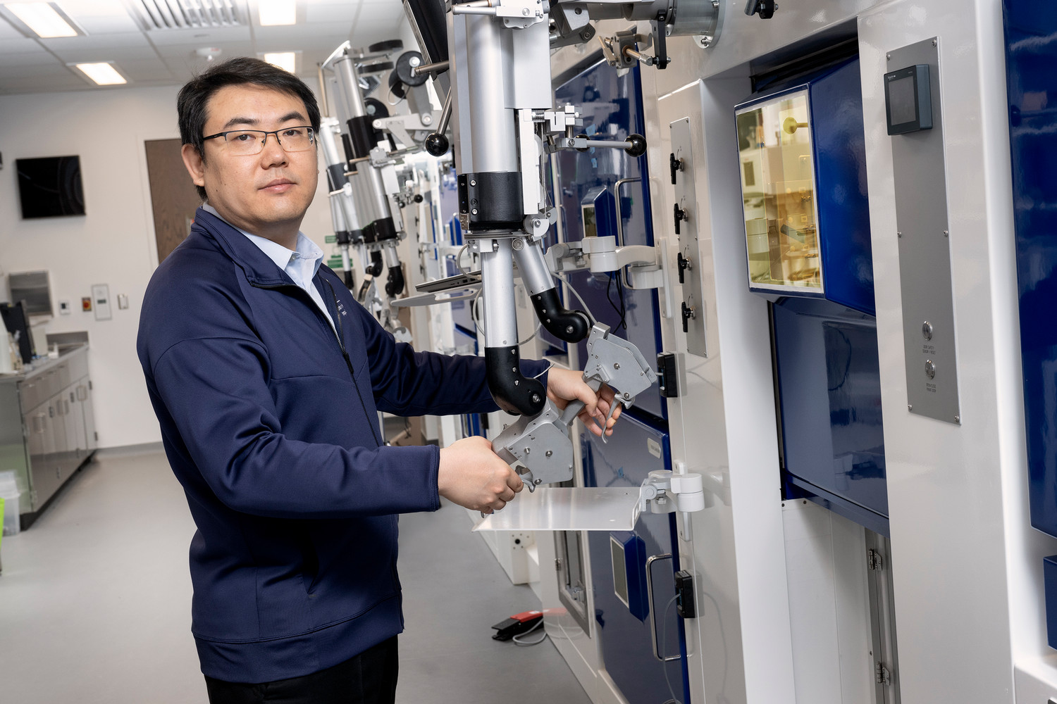 scientist standing in radiopharmacy