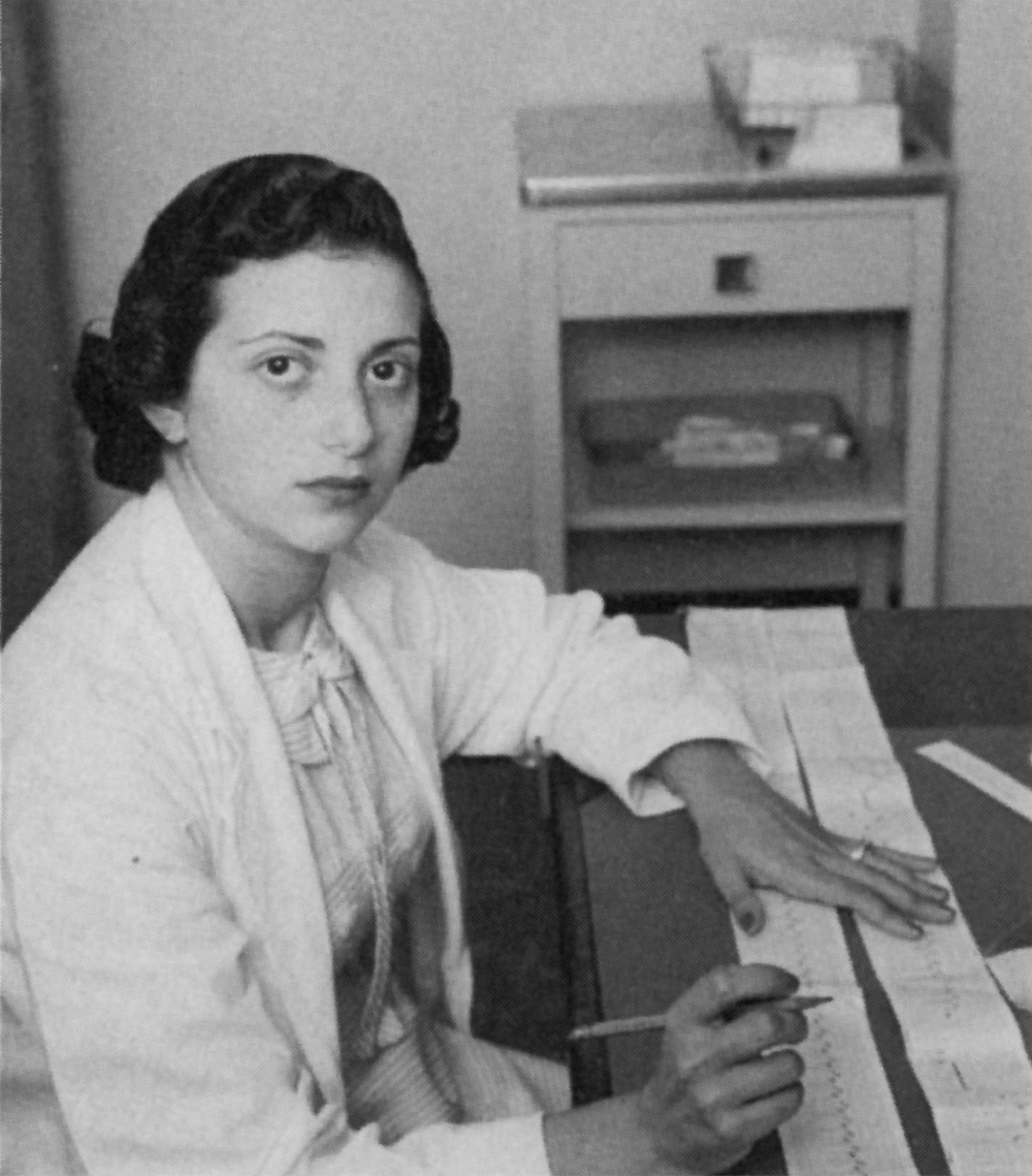 Nanette Wenger at desk