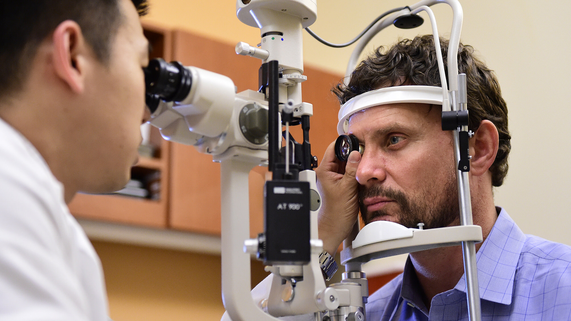 Doctor performing eye examine