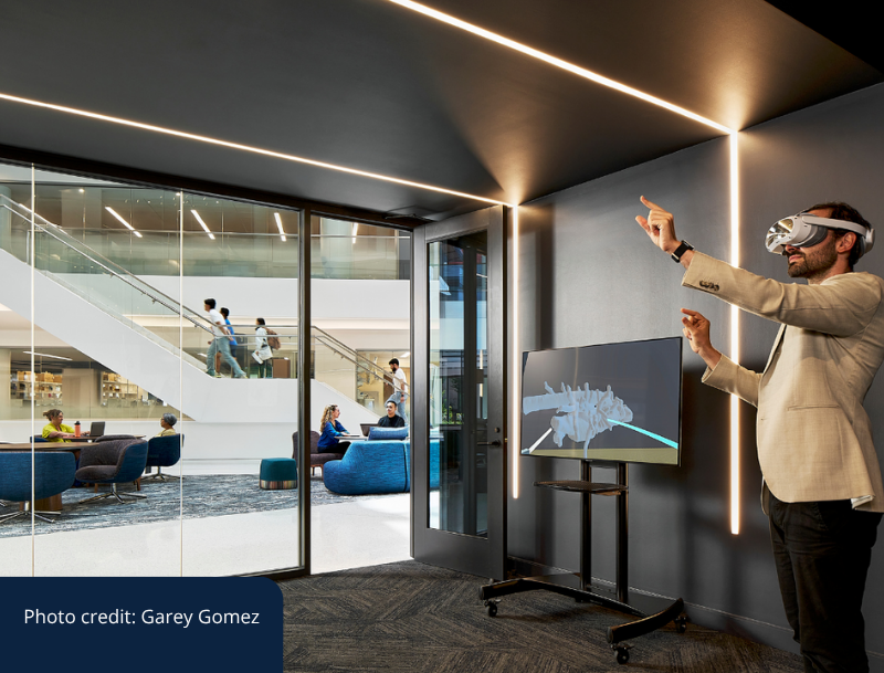 Above: Santiago Arconada Alvarez demonstrates Extended Reality in the Innovation Center. Photo credit: Garey Gomez