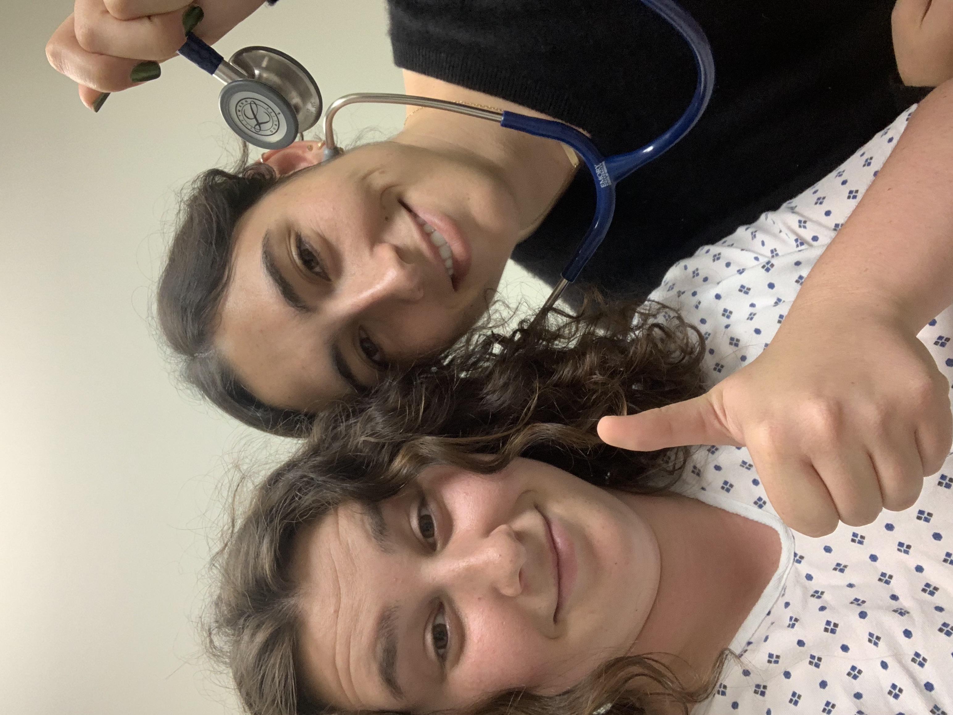Above: Jessy and her friend Lily Dresner (L-R) enjoy learning physical exams.