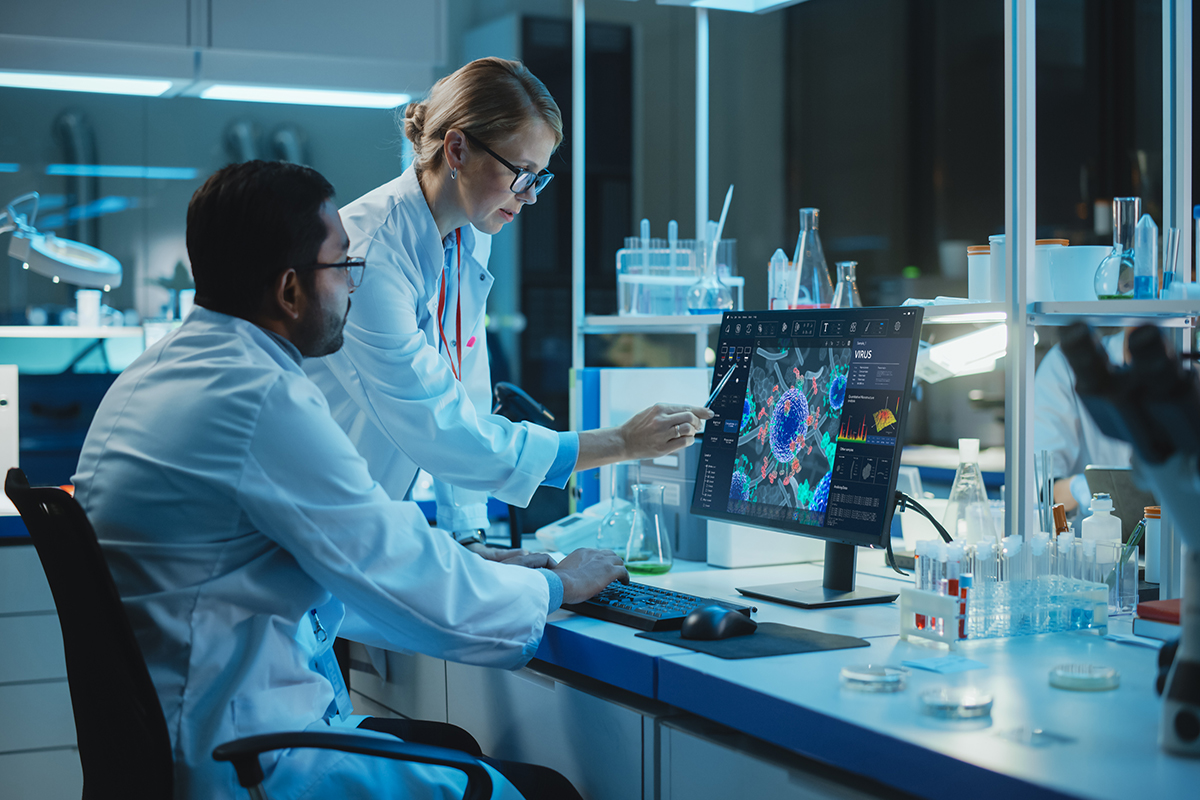 Stock image of 2 scientists in the lab.