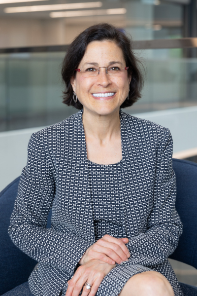 A portrait photo of Andi Shane