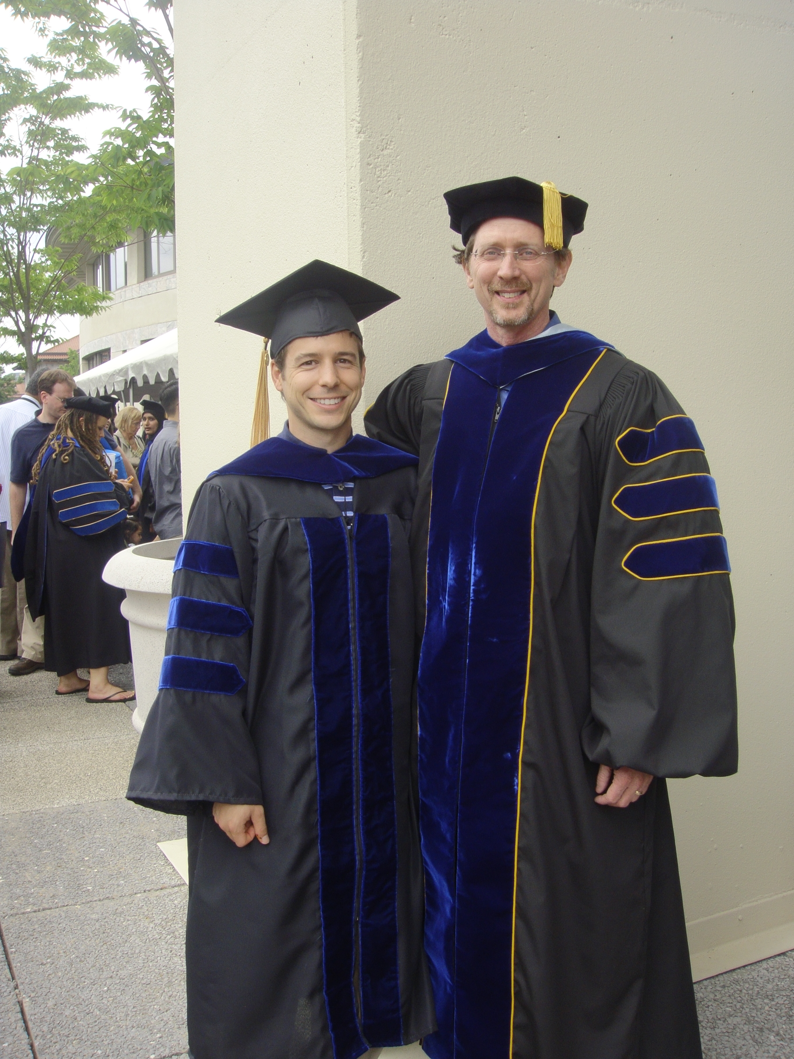 Christopher Vellano and Dr. John Hepler at graduation