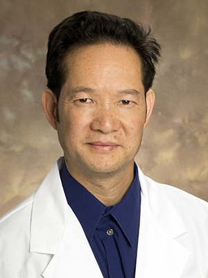 Portrait of Xingming Deng, MD, PhD.