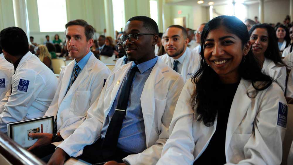 Surgical trainees attend a conference.